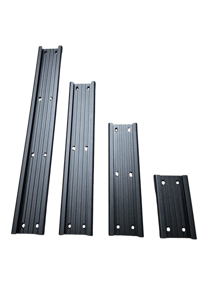 Four vertical metal beams arranged by height