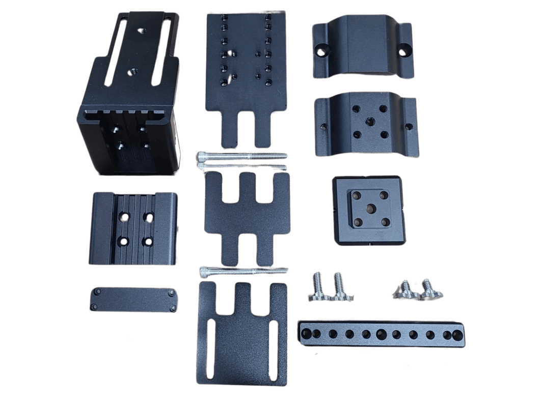 Metal brackets and screws on black background