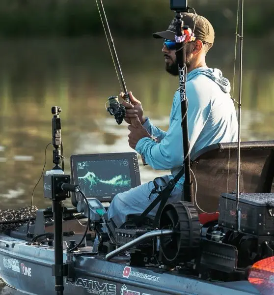 Man fishing from kayak with fishing gear